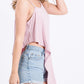 Solid Knit Top Is Fearing A Round Neckline And Side Hi-low