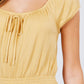 Short Puff Sleeve Front Tie Detail Smocked Waist Knit Gauze Top
