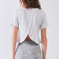 Short Sleeve Round Neck Petal Split Back Detail Crop Tee