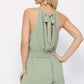 Textured Woven And Smocking Waist Romper With Back Open And Tie