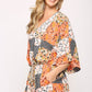 Patchwork Printed Surplice Romper With Waist Tassel Tie And Bottom Lining