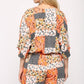 Patchwork Printed Surplice Romper With Waist Tassel Tie And Bottom Lining