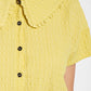 Peter pan collar textured knit button down top