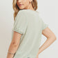 Textured knit surplice bottom string short sleeve top