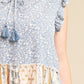 Woven Prints Mixed And Sleeveless Flutter Top With Tassel Tie